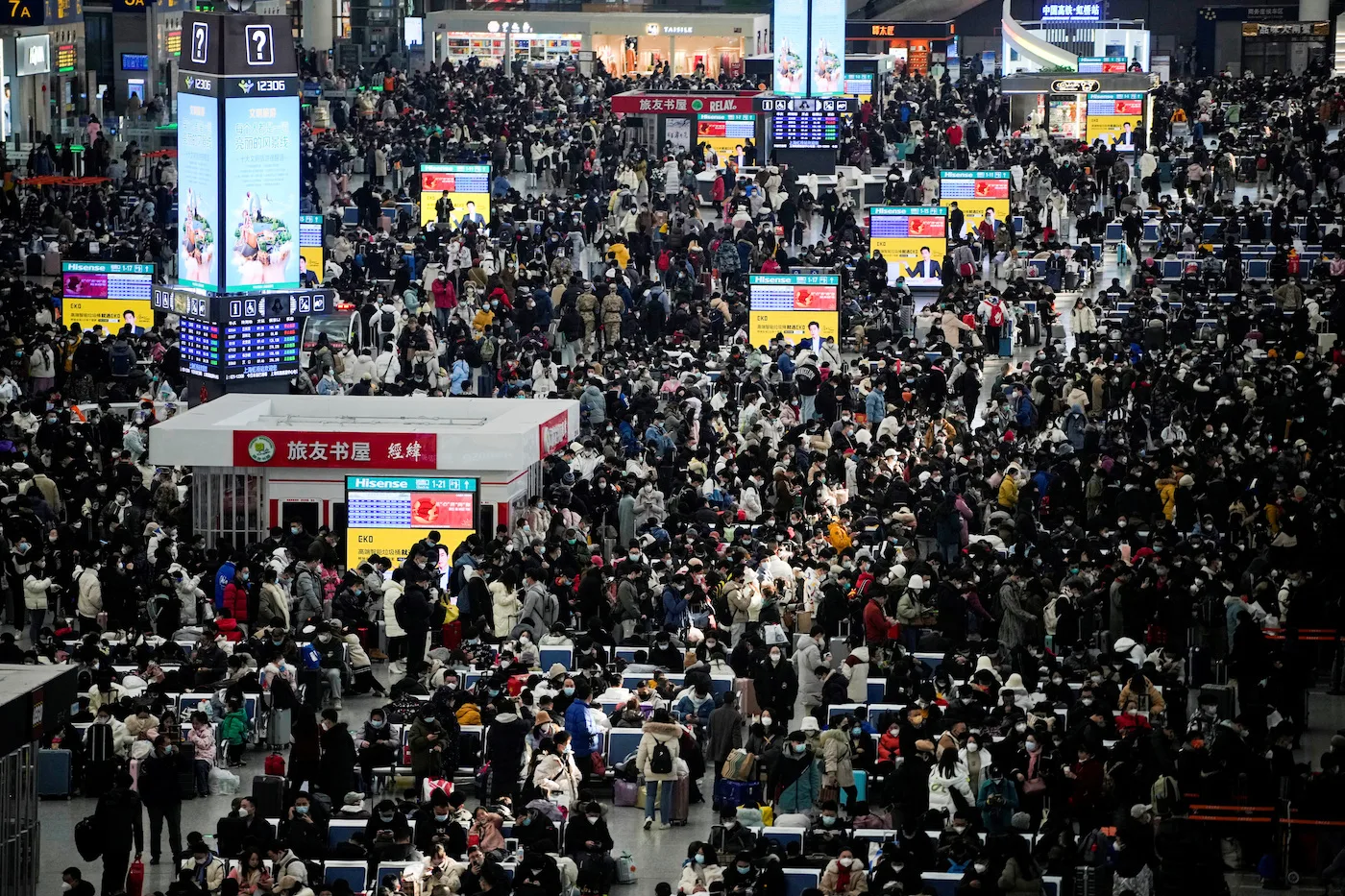 China says Covid outbreak easing on eve of travel rush