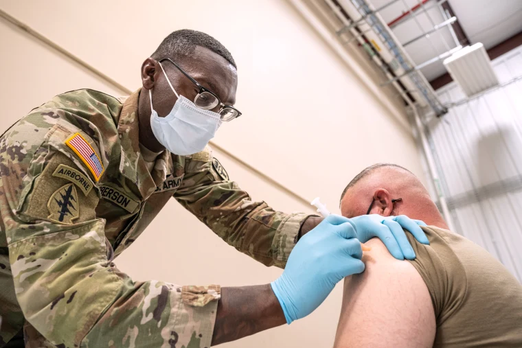 Pentagon Formally Rescinds COVID-19 Vaccine Mandate for Troops