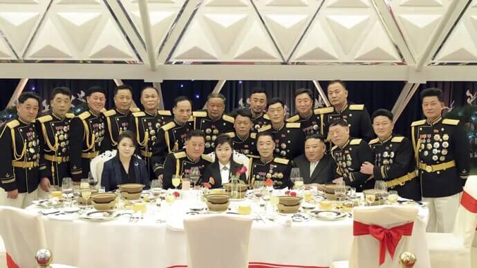 Kim Jong Un's heir apparent? North Korean leader flaunts daughter at military banquet