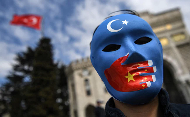 Chinese Cops' Move To Ensure Uyghurs Don't Fast During Ramzan